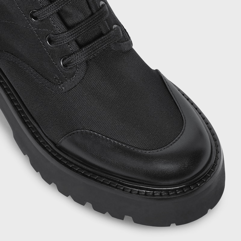 stivale celine bulky con allacciati in nylon e toro lucido
