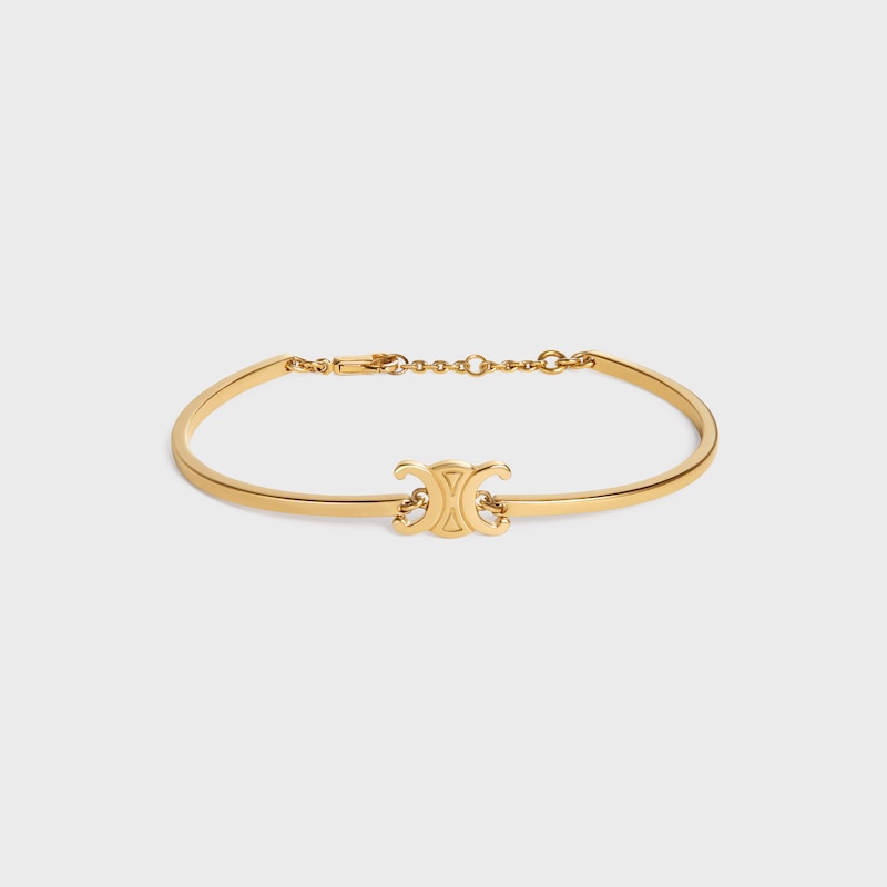 bracciale articolato triomphe in ottone con finitura oro