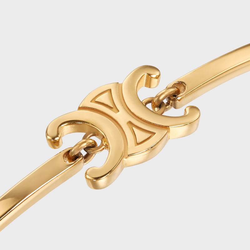 bracciale articolato triomphe in ottone con finitura oro