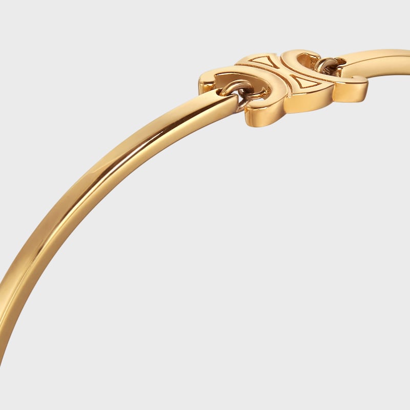 bracciale articolato triomphe in ottone con finitura oro