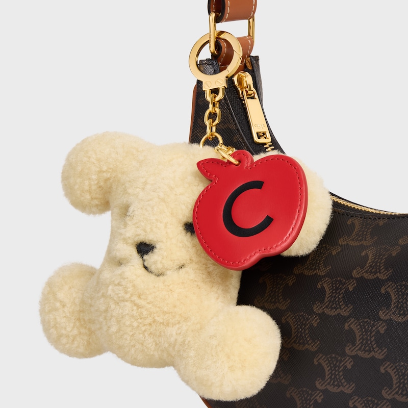 ciondolo triomphe pom-pom a forma di mela in shearling e pelle di vitello