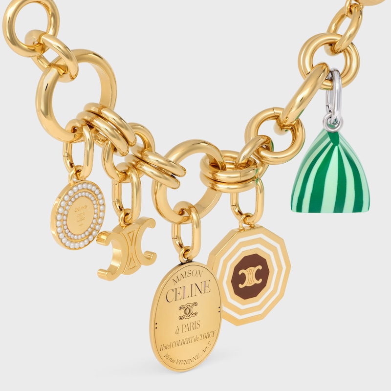 celine charms medaglia di perle in resina e ottone con finitura oro