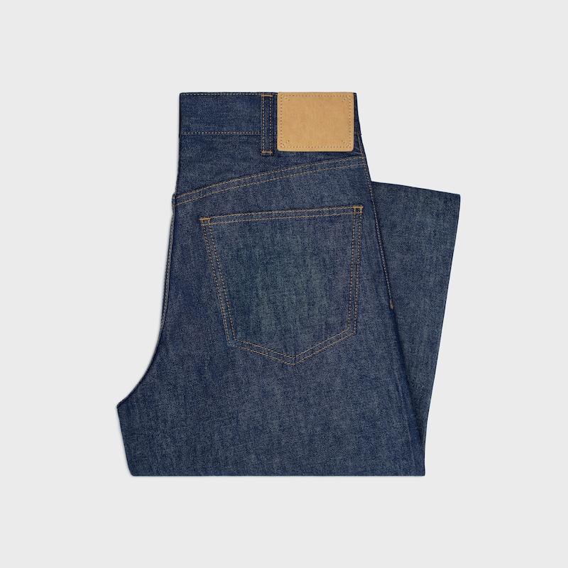 jeans da gattino in denim lavato grezzo