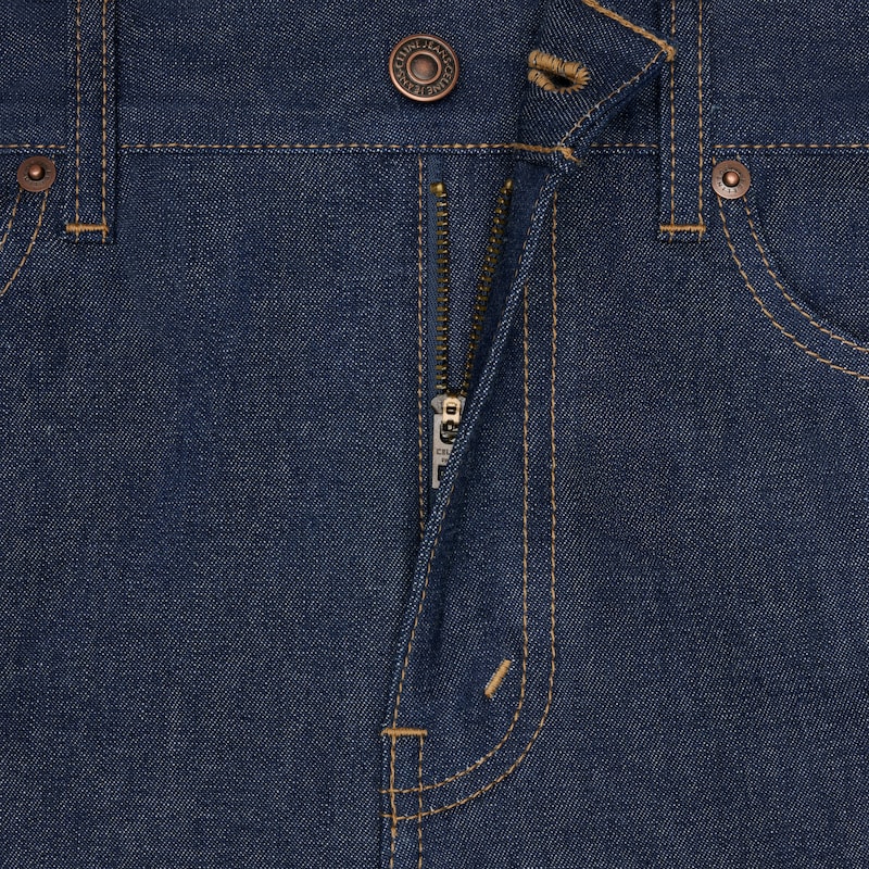 jeans da gattino in denim lavato grezzo
