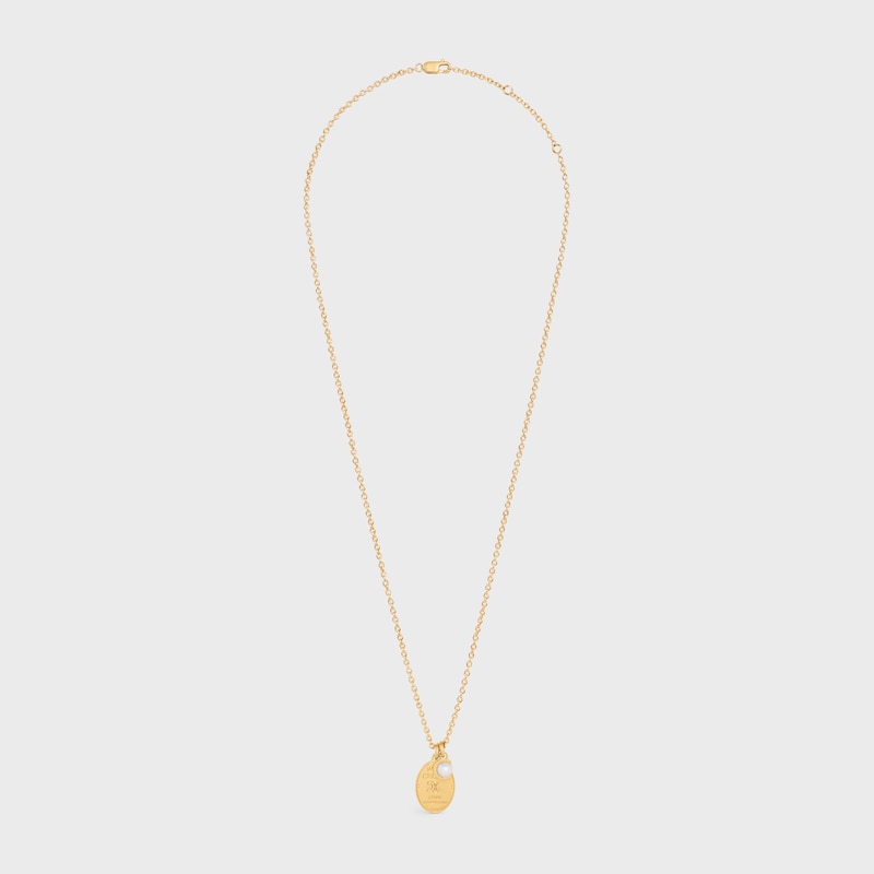 collana con medaglia les perles celine in resina perla e ottone con finitura oro