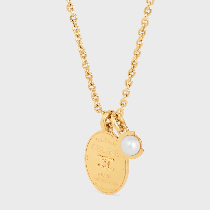 collana con medaglia les perles celine in resina perla e ottone con finitura oro