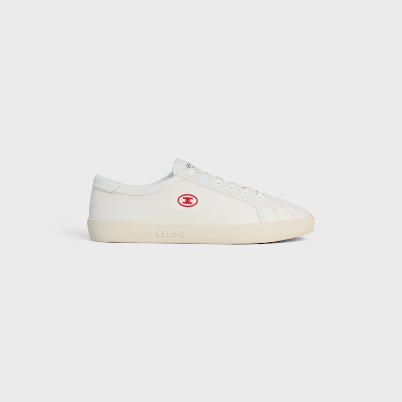 sneaker bassa celine lou con lacci e triomphe ricamato in tela e pelle di vitello