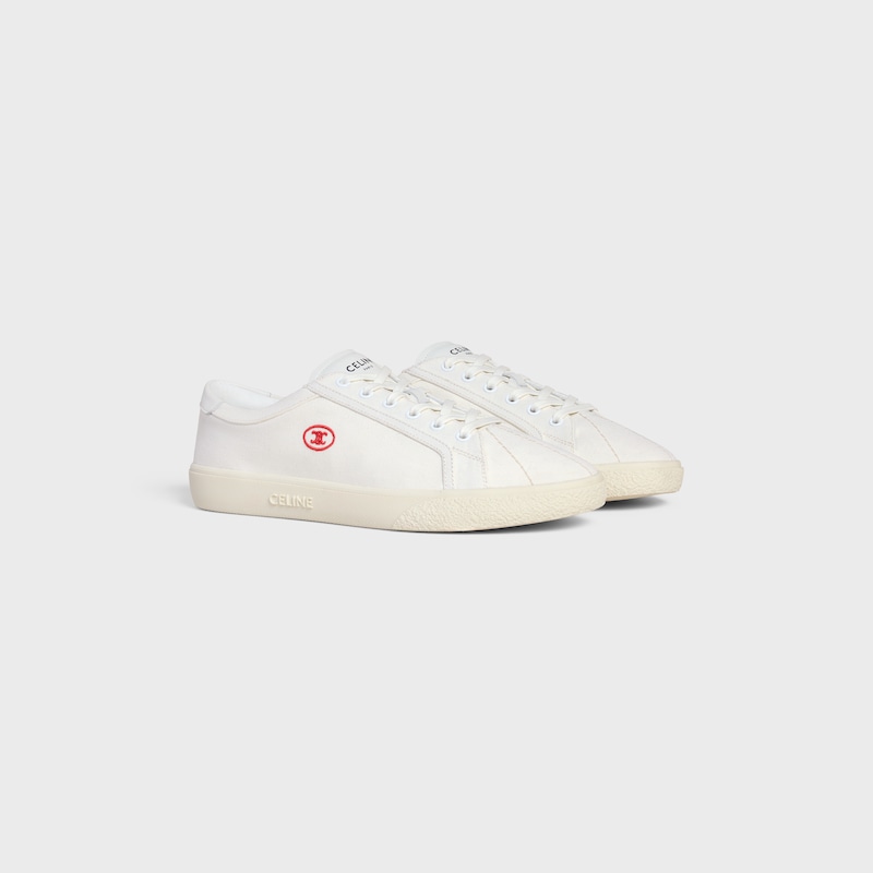 sneaker bassa celine lou con lacci e triomphe ricamato in tela e pelle di vitello