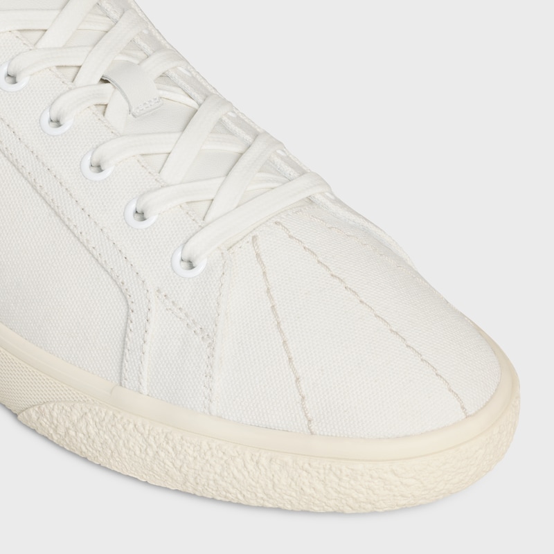 sneaker bassa celine lou con lacci e triomphe ricamato in tela e pelle di vitello
